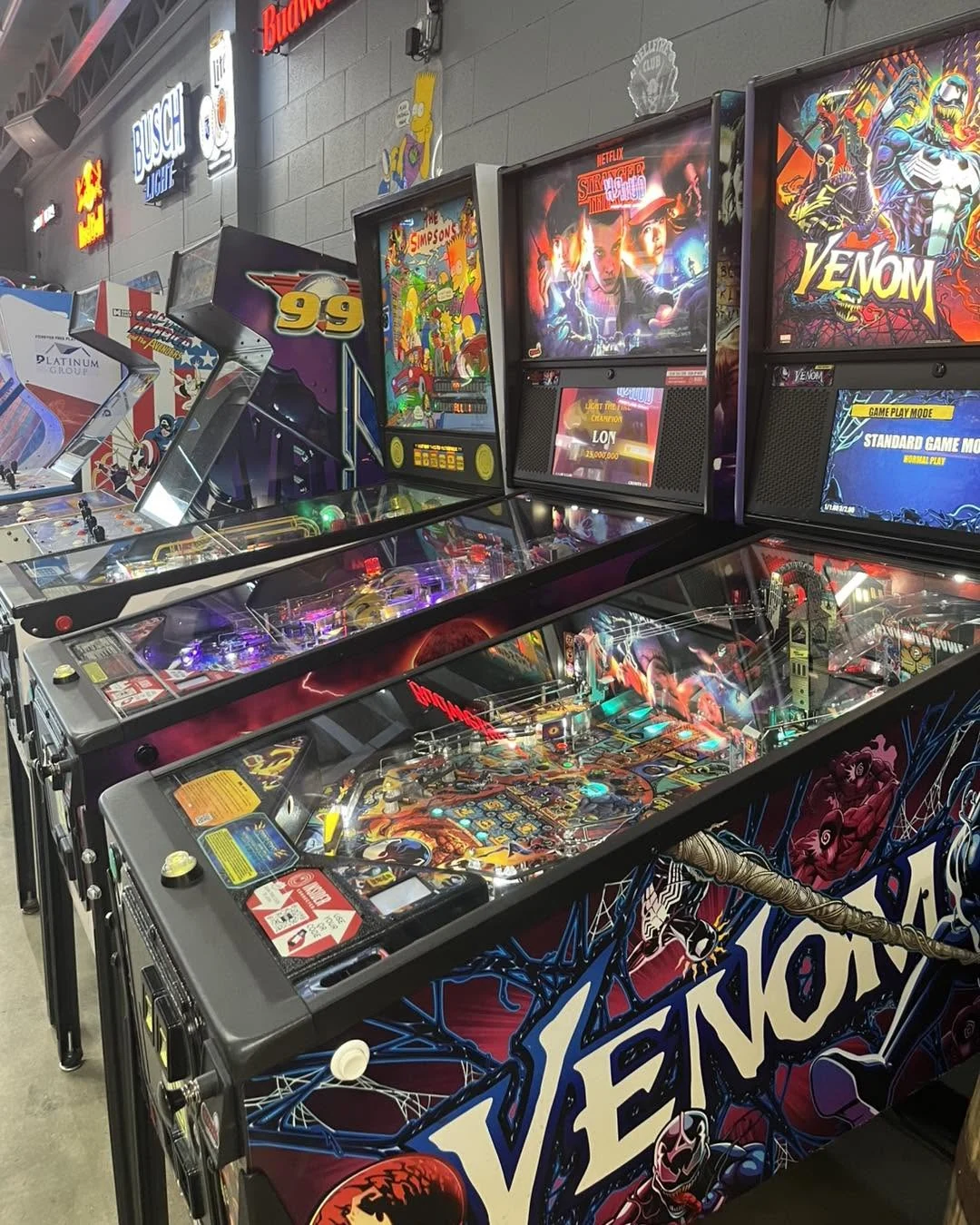 A row of pinball machines at Arcade 11