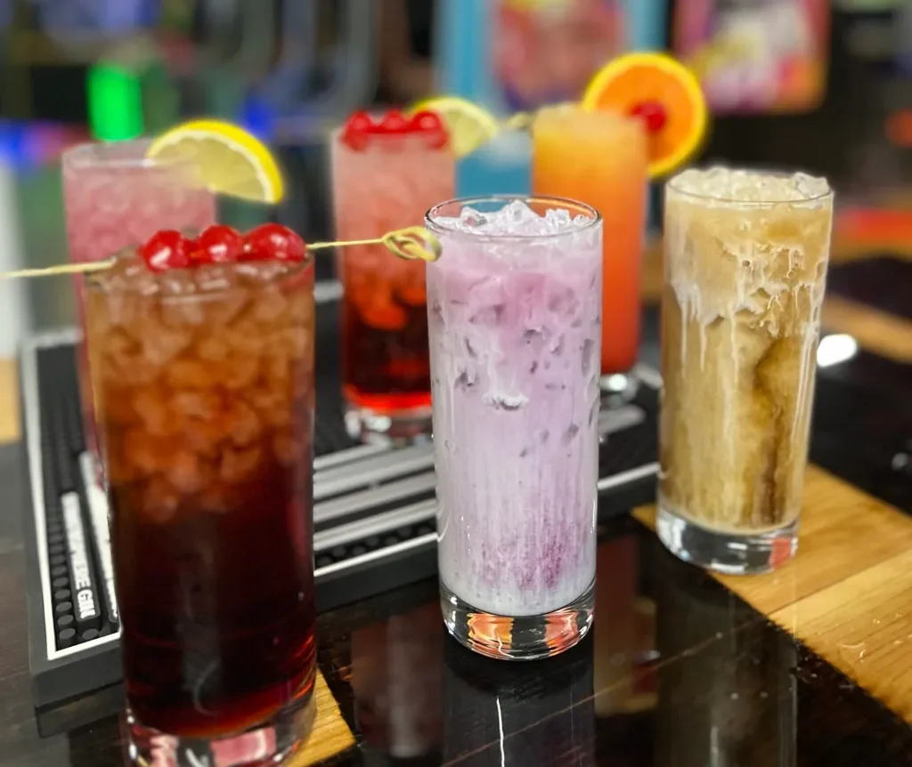Colorful specialty drinks at Arcade 11